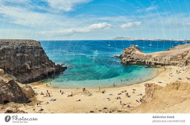 Sandy beach near turquoise sea summer resort water seashore sand tourist paradise rest fuerteventura spain canary islands seaside ocean vacation coast tourism