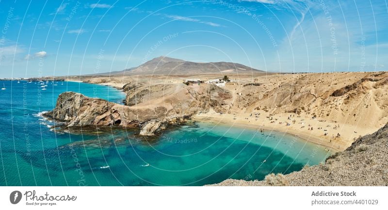 Sandy beach near turquoise sea summer resort water seashore sand tourist paradise rest fuerteventura spain canary islands seaside ocean vacation coast tourism