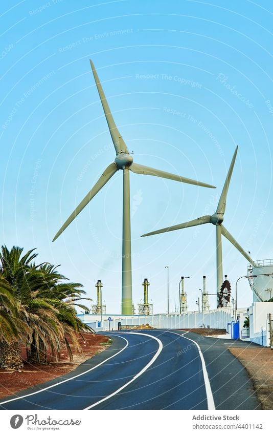 Road near wind power station road windmill blue sky cloudless facility energy electric fuerteventura spain canary islands turbine alternative environment