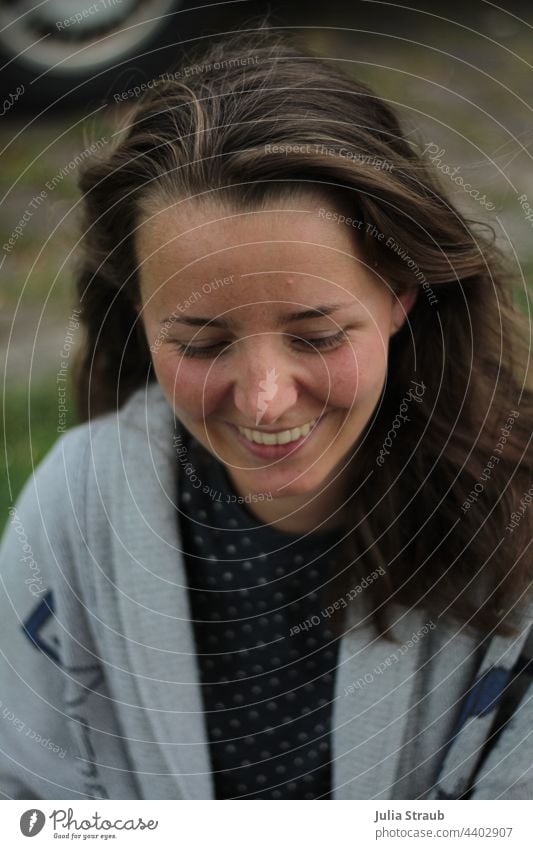 friendly laugh of a woman Attractive Self-confidence brown hair laughs Show your teeth feminine Joy Woman laughing Laughter hair in the wind open hair