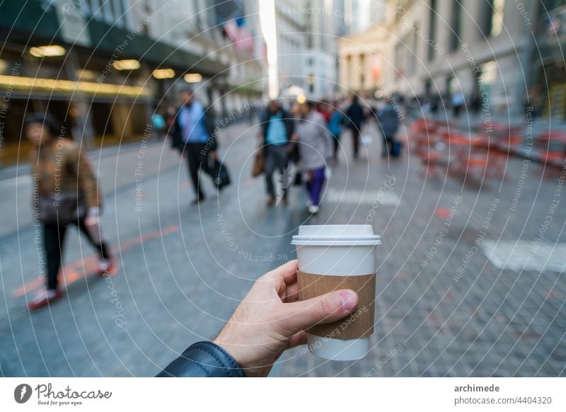 Coffee in New York City coffee cafe hand to go cup new york nyc usa businessman street commuting crowd crowded commuter travel walk pedestrian rush road