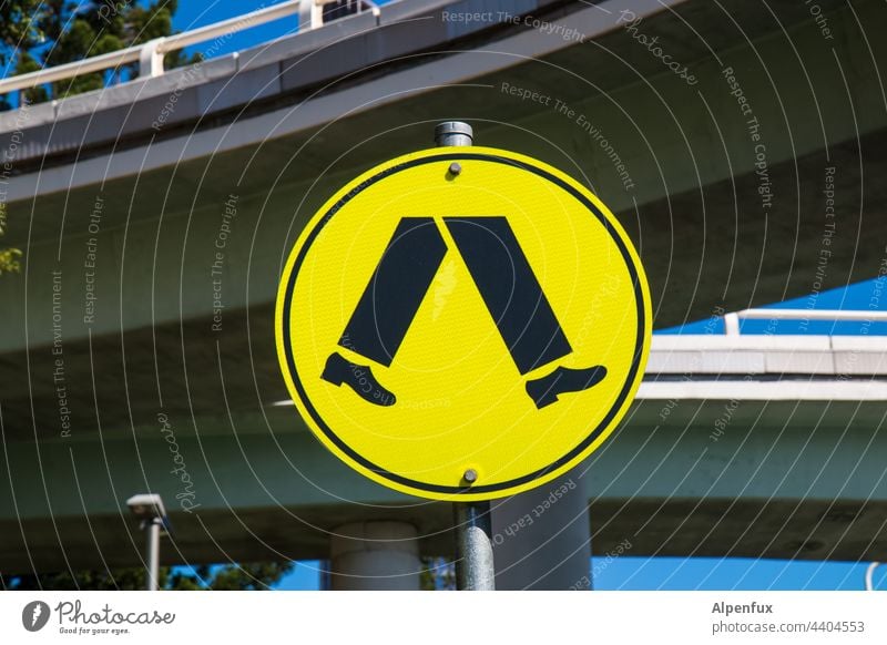 Footpath to the BVB Stadium Lanes & trails Signs and labeling Deserted Signage Transport Traffic infrastructure Street Pedestrian Town Day Yellow Road sign