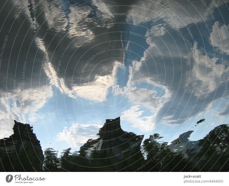 Reflection on calm water surface with distorted clouds Surface of water Water Water reflection Sky Clouds Silhouette Environment Distorted Abstract Surrealism