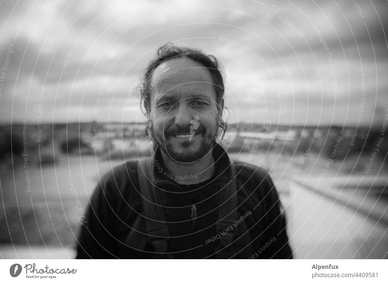 Man laughs Masculine Human being portrait Black & white photo Day Smiling Laughter Adults 1 Exterior shot Face Joy Looking Head Looking into the camera Forward