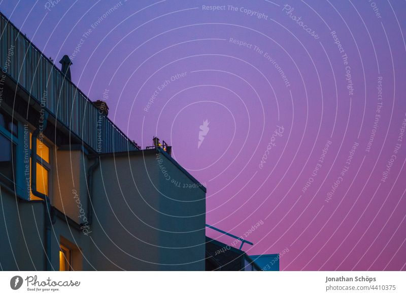 purple evening sky over row house at dusk Twilight Town house (Terraced house) Apartment Building House (Residential Structure) Pink pink Violet Deserted urban