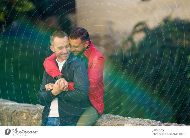 Gay couple in a romantic moment outdoors gay laugh laughing male love homosexual lgbt lgbtq relationship lovers albaicin granada boyfriend people adult happy