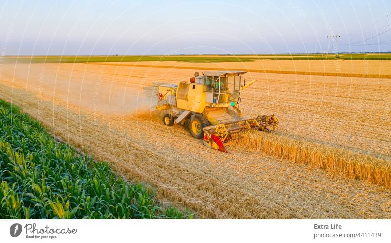 Above view on obsolete combine, harvester machine, harvest ripe cereal Aged Agricultural Agriculture Ancient Antique Cereal Combine Country Countryside Crop Cut