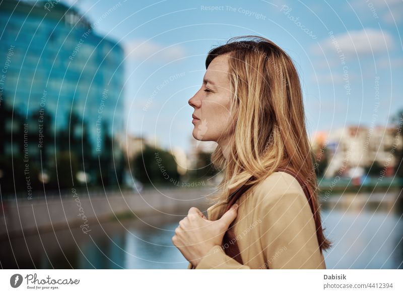 Close up portrait of caucasian woman city outside face outdoor street looking business strong people young girl identity success independent pride summer female