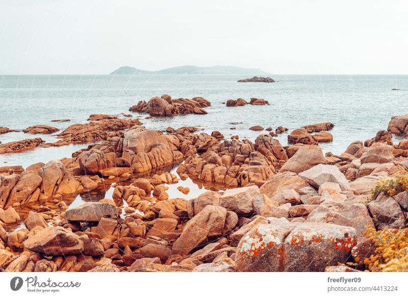 Landscape of a mediterranean coastline sea seascape rocks granite horizon copy space nobody beach scenic landscape day cliff nature water ocean travel storm