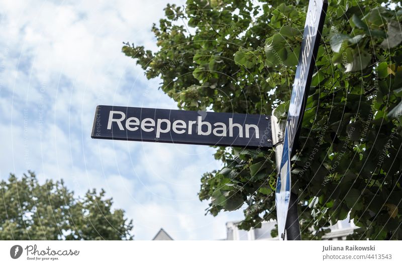 Reeperbahn street sign Hamburg St. Pauli Colour photo Sex Exterior shot Prostitute Red-light district Brothel Pimp Light Digits and numbers Kiez Day Tourism