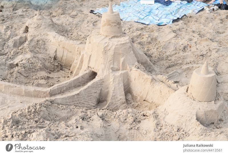 Sandburg on the beach Sandcastle Beach Vacation & Travel Summer Ocean Playing Summer vacation Exterior shot Colour photo Leisure and hobbies Infancy Joy coast