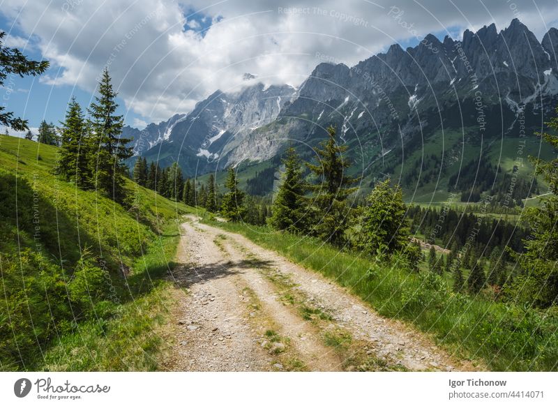 Hiking trail around Wilder Kaiser mountains, Tirol - Austria tirol austria kaiser wilder path landscape ellmau europe summer alps nature green clouds road