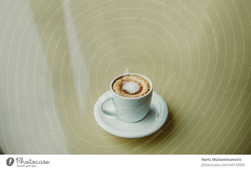 cup of coffee with white sugar on the top on the table aroma aromatic art background beverage black breakfast brown cafe caffeine cappuccino coffee cup