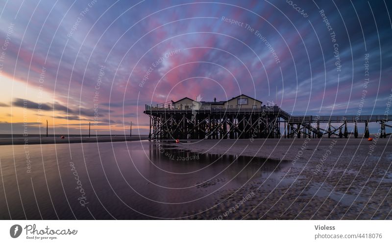 St. Peter Ording at sunset Saint Peter Ording Beach North Sea stilt house Stilts Clouds Sunset Dramatic reflection coast vacation travel