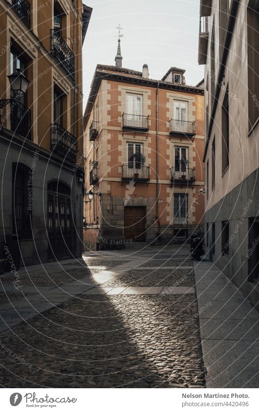 Old European facade with light and shadow travel vintage historic town nostalgic retro city landscape tour tourism urban alley european landmark sunset