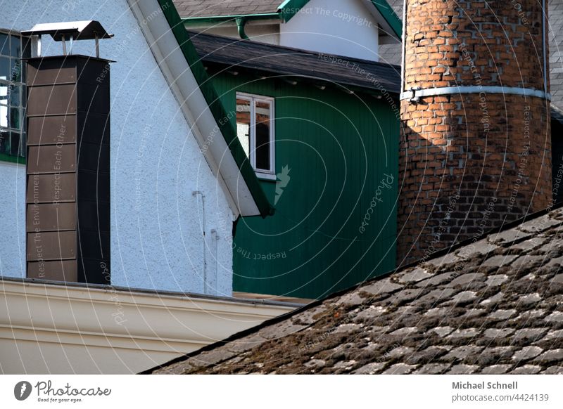 House mess with brick factory chimney Chimney Industry House (Residential Structure) roofs rooftop landscape Muddled diverse Difference disparate difference