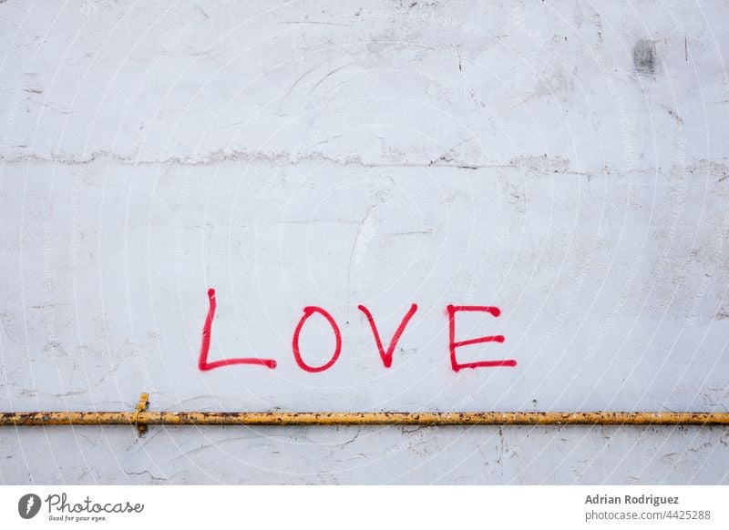 Text Love in Wall Wall (building) Graffiti Characters Wall (barrier) Emotions Declaration of love Romance With love Display of affection Exterior shot