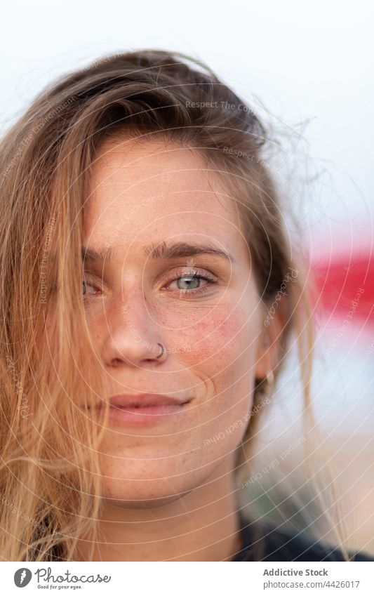 Charming woman standing looking at camera sea wet hair charming summer tranquil carefree female calm serene enjoy idyllic quiet paradise dreamy harmony beauty