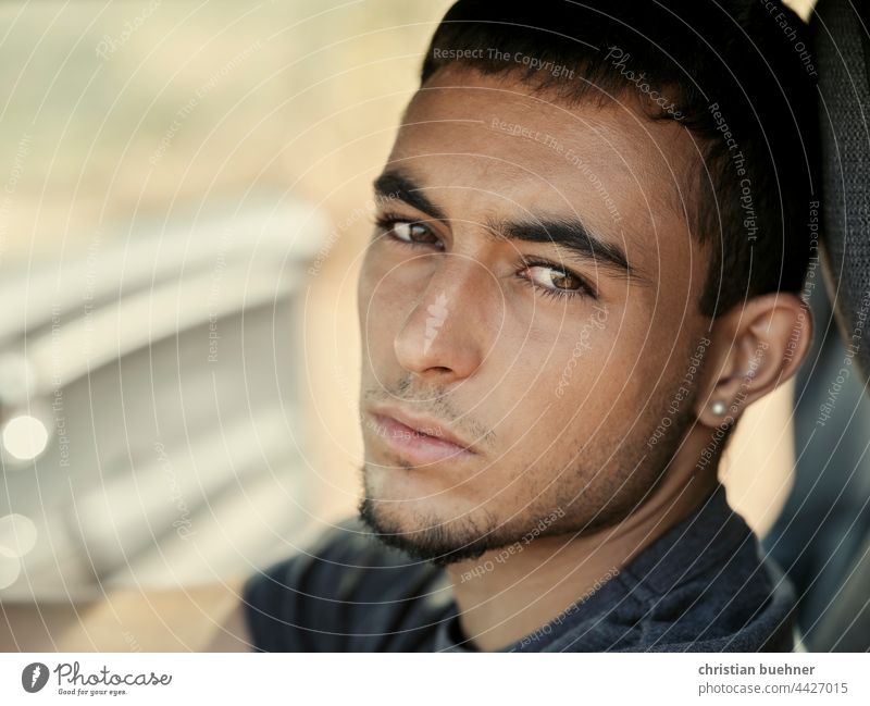 portrait of a boy in car Car Window movie Actor Subdued colour Earnest critical erotic doubt Cool Facial hair eyes pretty 19 years Intensive Interesting