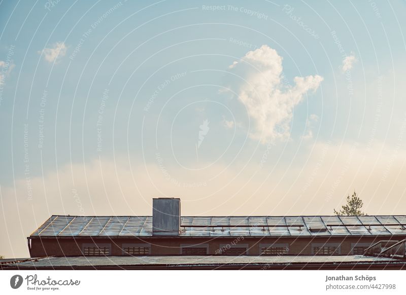 wide sky over house roof House (Residential Structure) Warehouse Building Roof Hall Chimney Industrial area Sky morning sun sunny Clouds Copy Space Sky blue