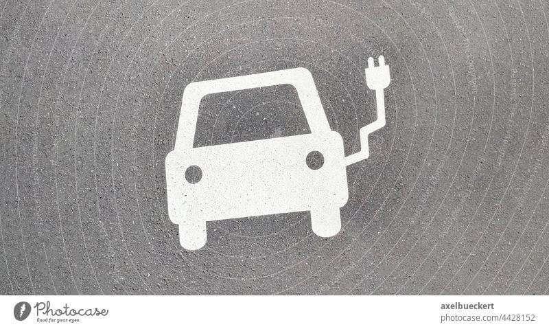 E-car charging station symbol on asphalt e-car electric car e-car charging station Loading dock Recharge automobile Transport Means of transport Road traffic