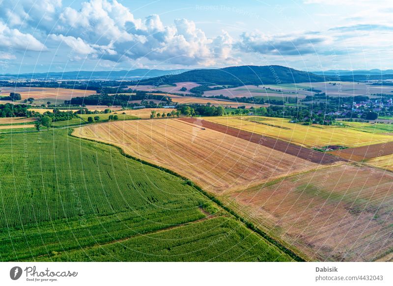 Aerial view of agricultural and green fields in countryside agriculture landscape farmland mountains aerial forest drone highland lower silesia poland scenery