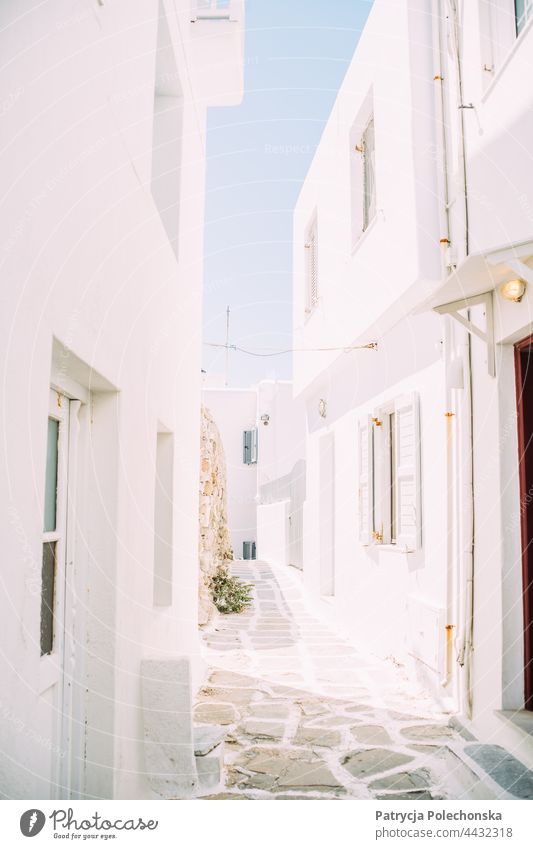 White architecture buildings in a small street, alley on Mykonos, Greece Architecture Alley Street Building houses Bright