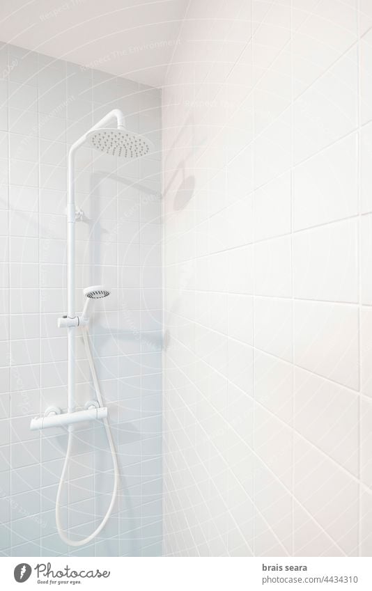 Shower on white tile bathroom shower head spa relaxation nobody hardware hardware store upgrade water reformation reform home bricolage bathroom interior