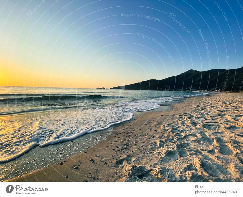 Beach and sea at dawn Ocean Dawn Landscape coast Nature Deserted Sky Sunrise Sandy beach Horizon mountains