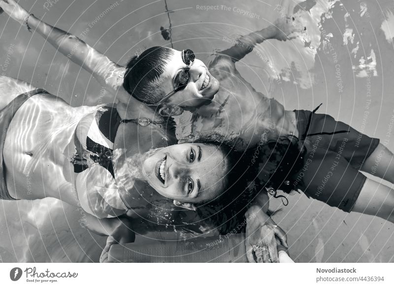 Boy and girl in the swimming pool. top view, black and white image children Child Boy (child) Girl Playing Joy Brothers and sisters Sister Happiness Day 2