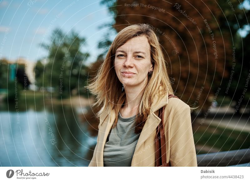 Close up portrait of caucasian woman city outside face outdoor street looking business strong people young girl identity success independent pride summer female