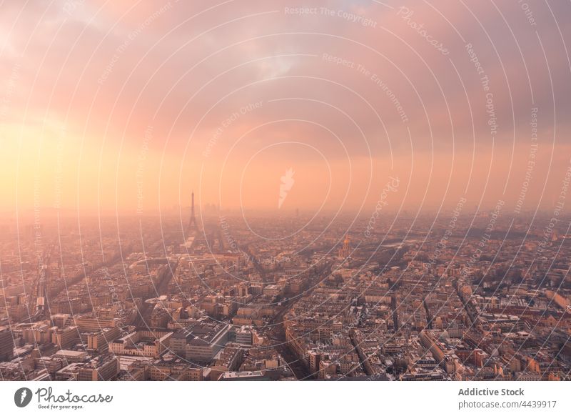 Cityscape with old buildings along roads district architecture city historic urban cityscape capital landmark tower haze residential heritage central rooftop