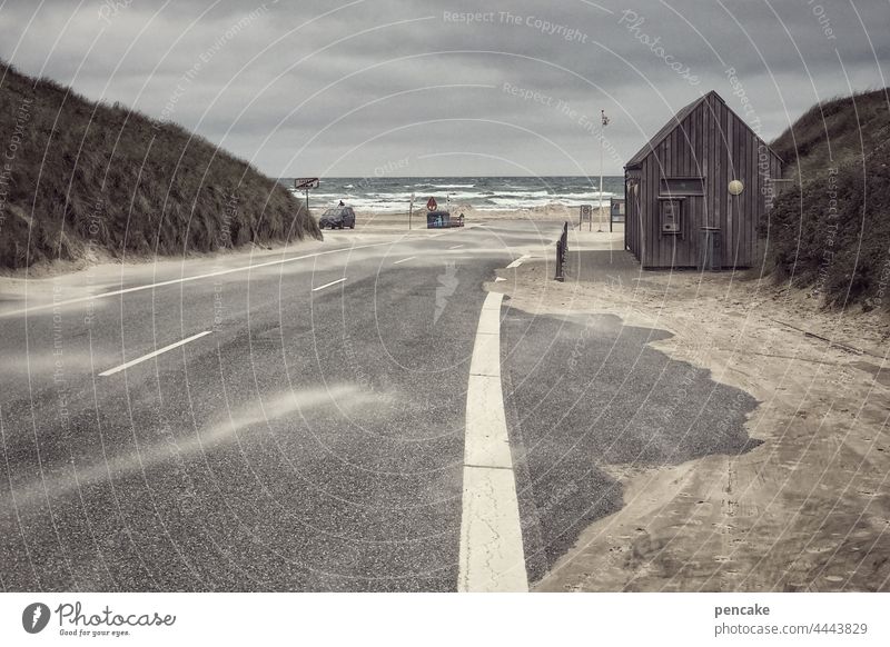 stormy welcome Ocean North Sea Denmark Løkken Street Beach Wooden hut Parking lot off Shore leave ship car vacation travel Wind coast Vacation & Travel Sky