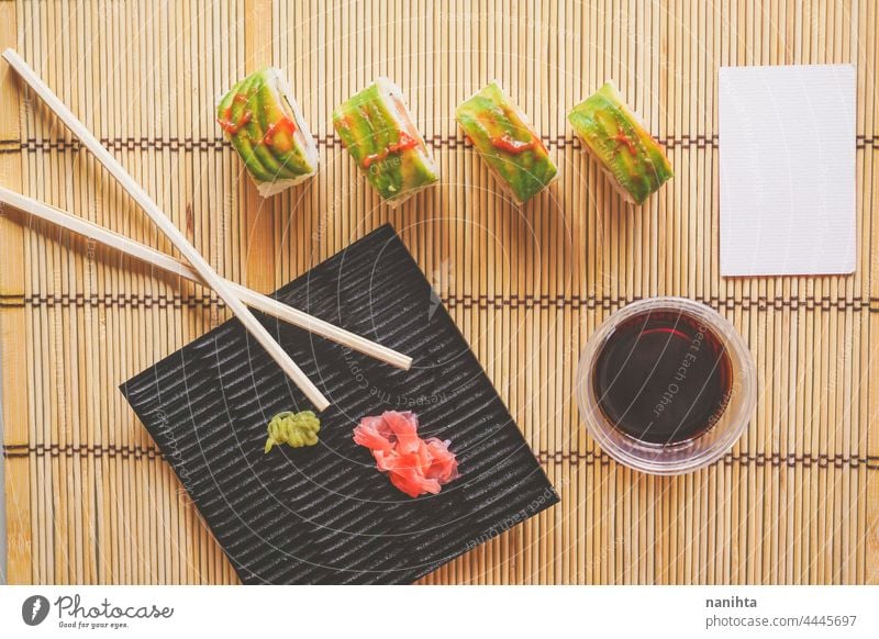 Fushion food of modern california roll sushi japanese fusion avocado delicious soy soy sauce bamboo sushi mat rice recipe take away take away food temptation