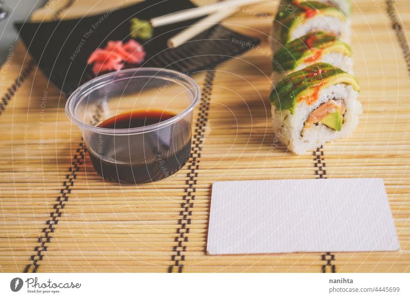 Fushion food of modern california roll sushi japanese fusion avocado delicious soy soy sauce bamboo sushi mat rice recipe take away take away food temptation