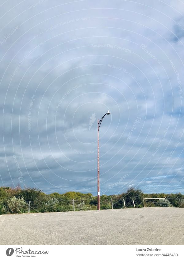 Lamp post and the empty parking Parking Lantern Street lighting Lighting Sky Deserted Parking lot Street lamp Parking lot lighting Colour photo Exterior shot