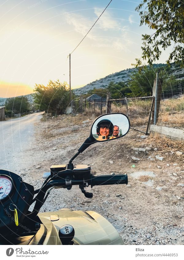 Selfie of a happy couple in the rear view mirror of a quad bike. Trip. Quad vacation Couple Adventure Vacation & Travel Freedom Nature Joy fortunate Good mood