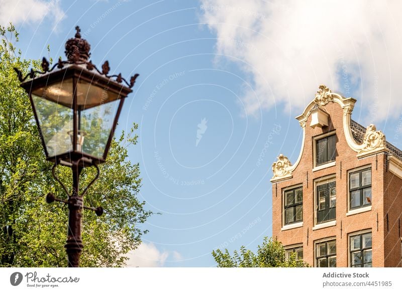 Facade of old building facade brick architecture culture classic heritage historic medieval aged window street stone brick wall residential history tradition