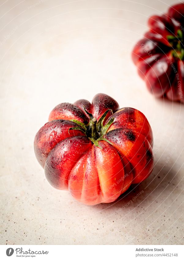 Closeup of several red tomatoes raw fresh vegetable ripe background food closeup vegetarian ingredient organic healthy group natural nature diet color