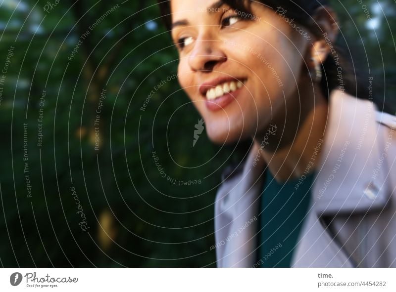 Estila portrait Woman Smiling Laughter Evening sun evening light Jacket Braids fortunate cheerful Joy Movement rays Half-profile Forest