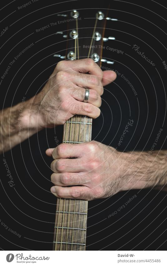 Musician with a guitar in his hands Guitar guitar bridge To hold on Passion Make music Musical instrument Culture