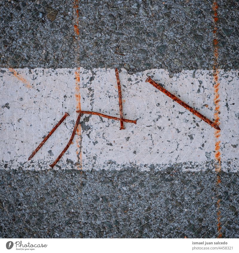 rusty nails on the ground old textured backgrounds asphalt surface Wallpaper Iron