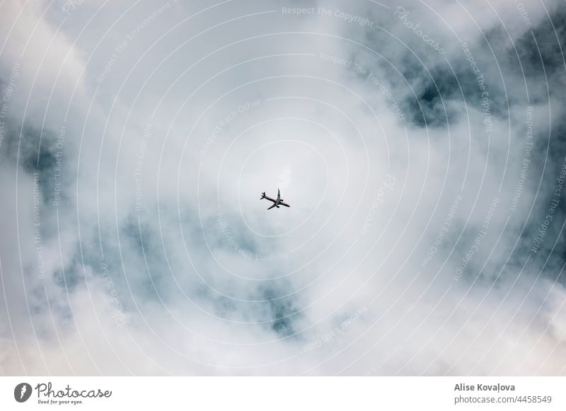 Airplane in the clouds Clouds Nature cloudscape Flying Transportation vehicle Vacation & Travel dreamy Passenger plane Aviation Sky Blue Freedom Traveling