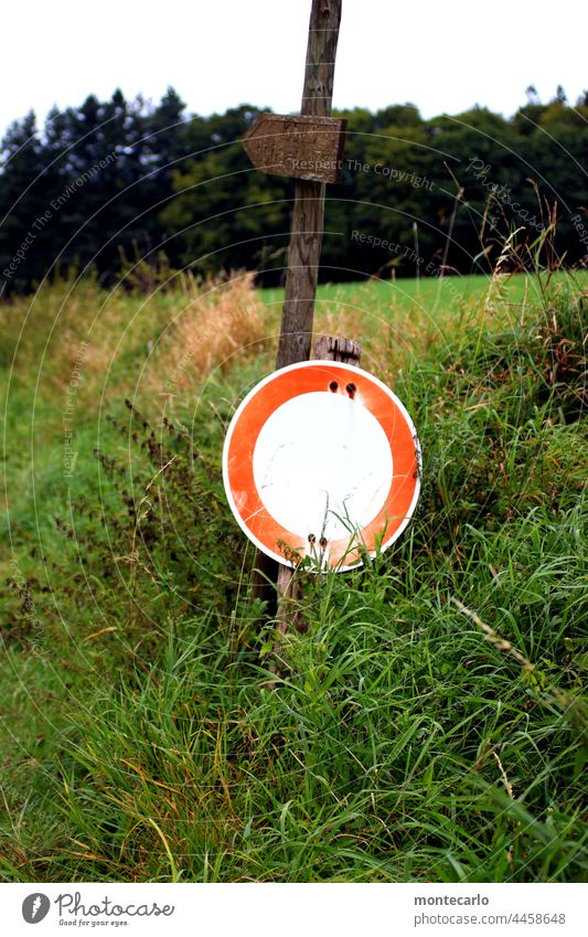 Signs | weathered prohibition sign with signposts Prohibition sign Signs and labeling Red White Round Transport Road sign interdiction