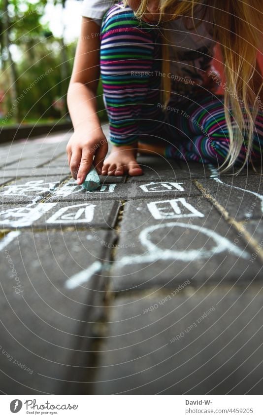 Child painting on the floor with street crayon Chalk Painting (action, artwork) Girl street-painting chalk Creativity Employment out Infancy Playing Ground