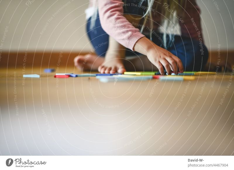 Child playing with toy on the floor Playing independent Toys Children's room stand-alone concentrated meek Infancy Girl hands Grasp Dexterity