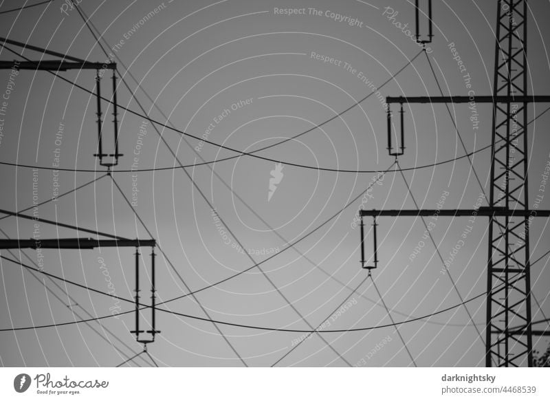 Detail of a high voltage overhead line of older design with insulators for 110 and 220 kilo volts pylon transformer station Deserted Renewable energy