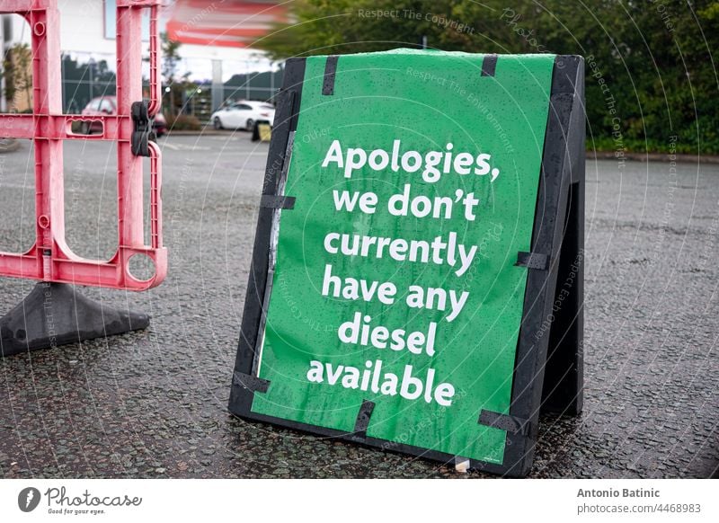 Green sign apologizing in England for unavailability of diesel fuel. Petrol crysis in United Kingdom as fuel shortage hits the country, people waiting in lines for fuel in the whole country