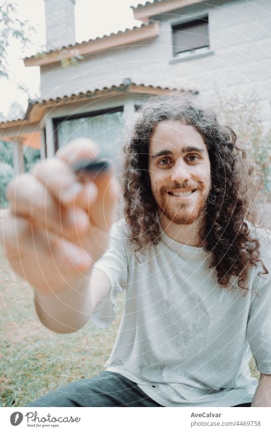 Portrait of Artist Working. Close-up Shot portrait, long hair young man painting oil person artist brush canvas indoor inspiration occupation painter talent