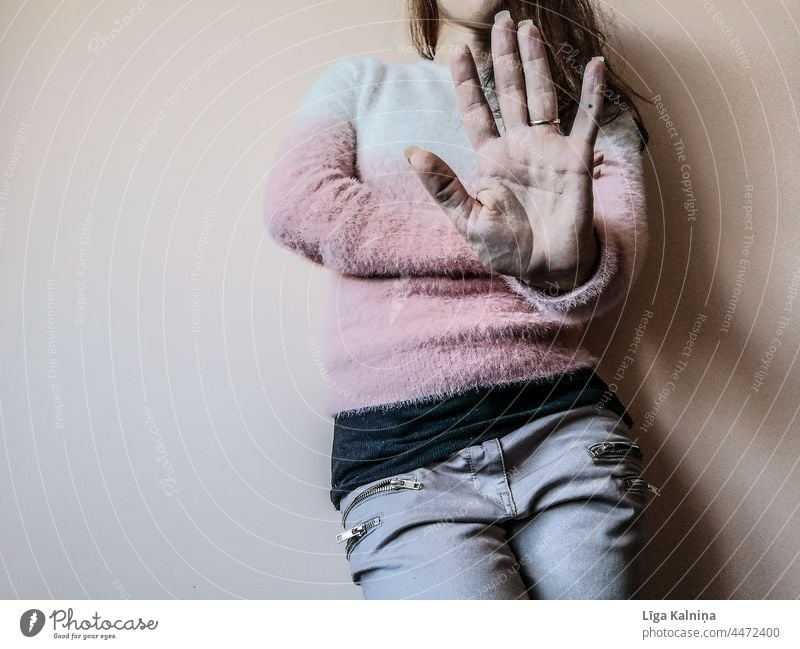 Female legs against wall showing stop gesture Stop Gesture Hand concept hand sign woman no Human being Fingers Adults Palm of the hand body part